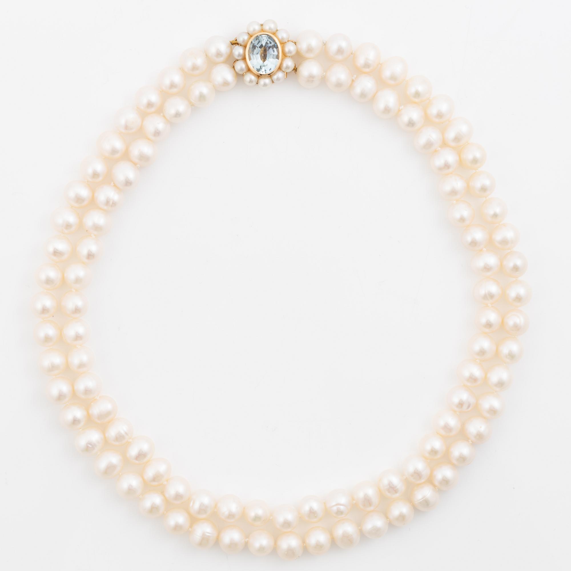 Pearl necklace, double-stranded with cultured freshwater pearls, clasp 18K gold set with aquamarine and cultured pearls, Jarl Sandin.