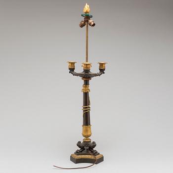 A first half of the 19th century bronze table lamp.