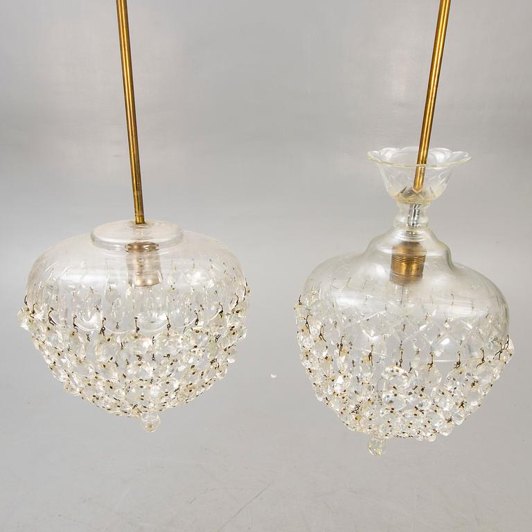 A pair of ceiling pendants around 1900.