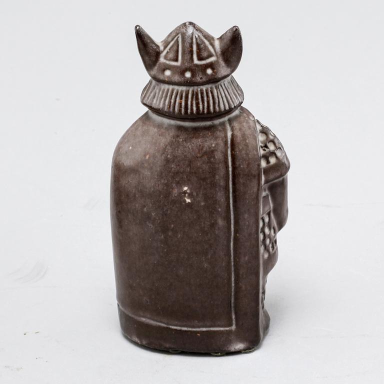 Eight stoneware figurines by Uppsala-Ekeby, from the latter half of the 20th century.