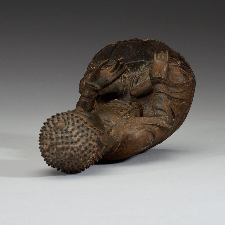 A bronze figure of a seated Buddha, late Ming dynasty (1368-1644).