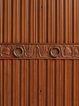 A Swedish Modern stained pine cabinet, 1940s.