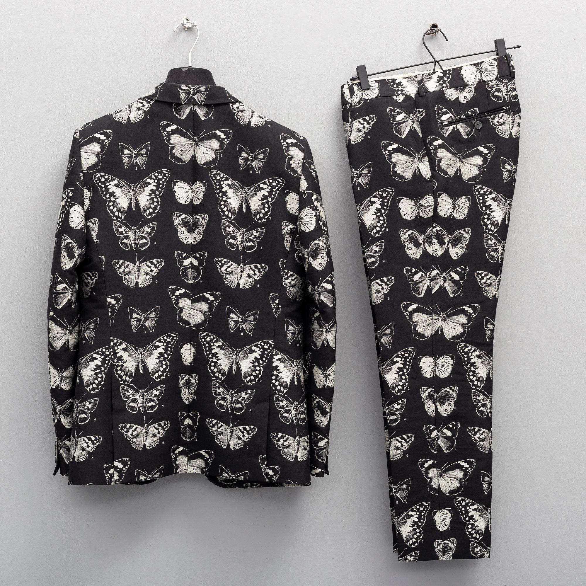ALEXANDER MCQUEEN, a wool mix suit, Italian size 52. Fashion show