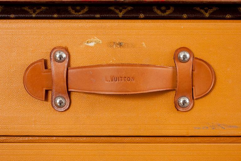 An early 20th cent monogram canvas trunk by Louis Vuitton.