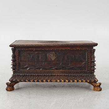 A baroque style wooden chest, 19th century.