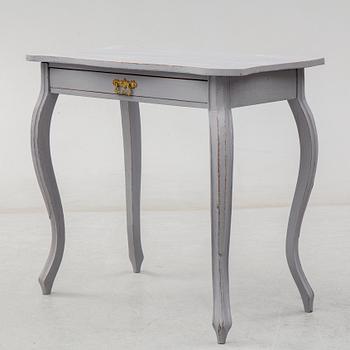 A circa 1900 Rococo style writing desk.