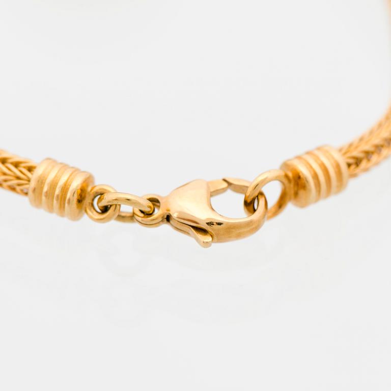 A BRACELET, "Sun lion", 18K gold. Kalevala Koru 1999.