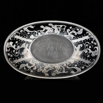 Simon Gate, a Swedish Grace engraved glass bowl with stand, Orrefors 1930, model 147, engraved by Karl Rössler.