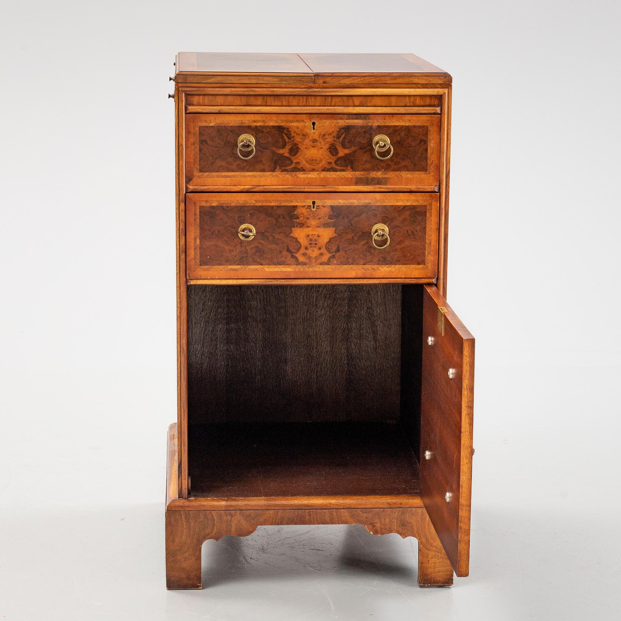 Byrå, England, 1900-tal.