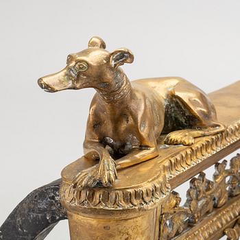 A pair of Louis XVI 18/19 century fire dogs.