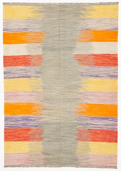 A kilim rug, ca 252 x 175 cm.