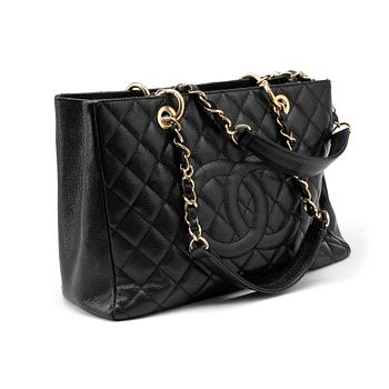 596. CHANEL, a black caviar leather purse, "Grand Shopping Tote".