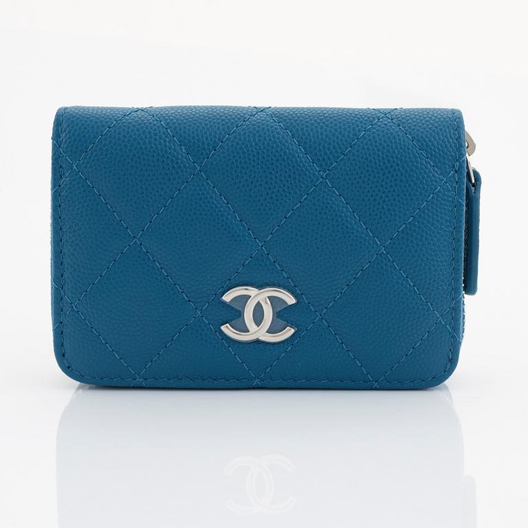 Chanel, a blue caviar leather wallet.