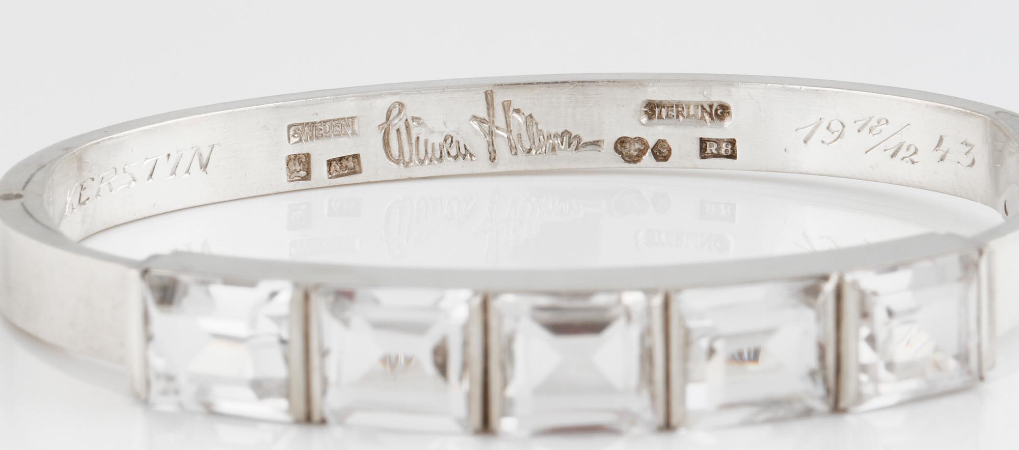 ARMRING, sterlingsilver med fasettslipad bergkristall, Wiwen Nilsson, Lund, 1943. Vikt 26,7 gram.