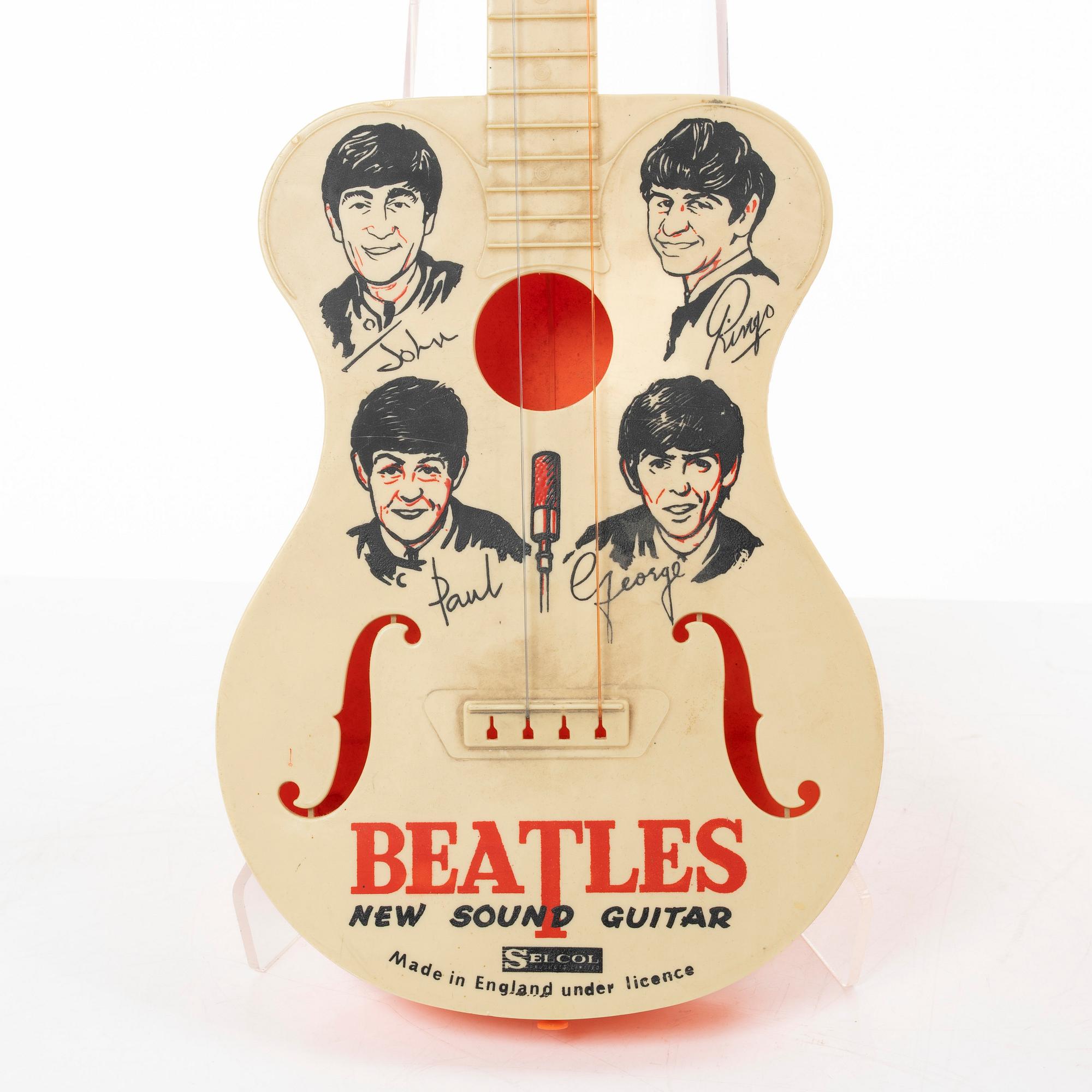 The Beatles, "New Sound Guitar", toy guitars, 2 pcs, Selcol Products Limited, England. 1960s.