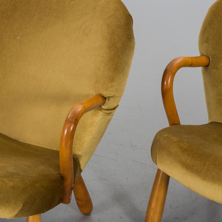 A pair of armchairs attributed to PHILIP ARCTANDER, 'Clam Chair'/'Muslinge', 1940's/50's.