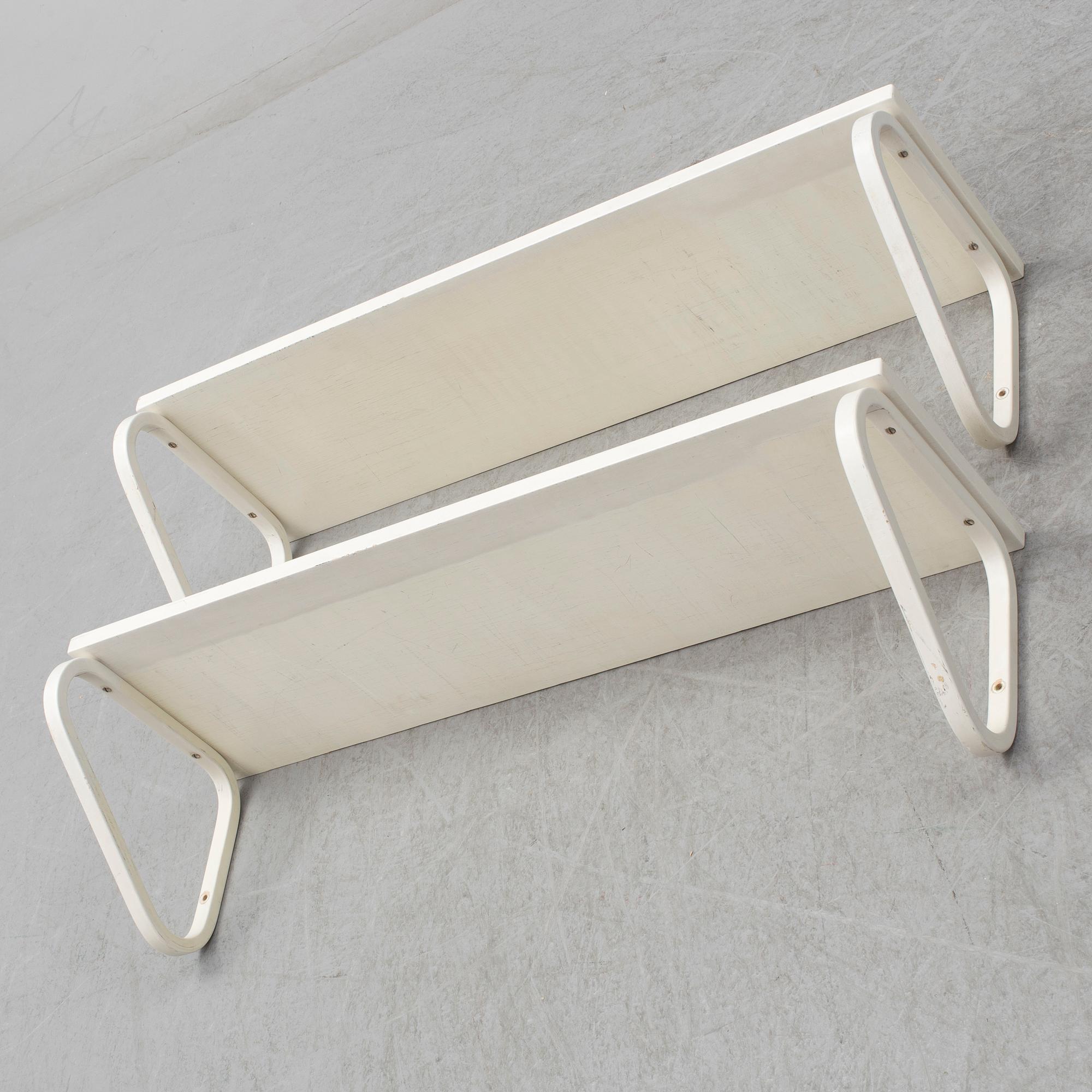 ALVAR AALTO, a pair of model 112 painted wall shelves from Artek, Finland.
