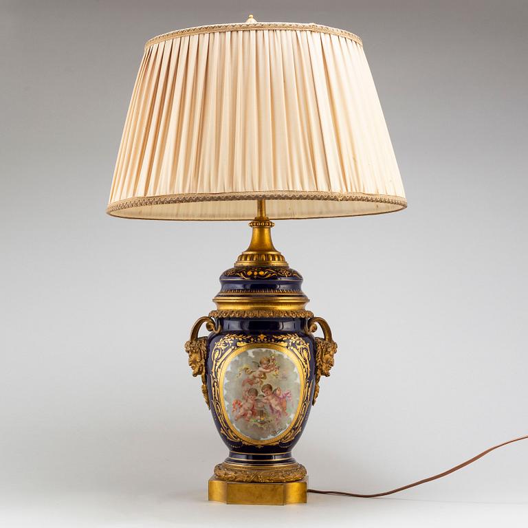 A French bronze mounted porcelain table lamp, late 19th Century, signed Thuilier.