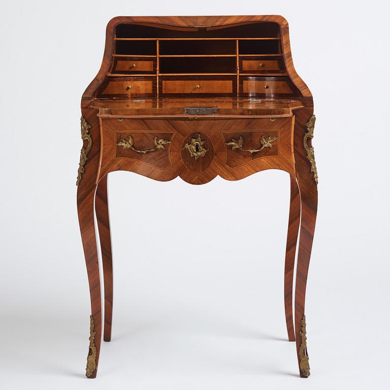 A rococo parquetry secretaire, Stockholm, later part of the 18th century.