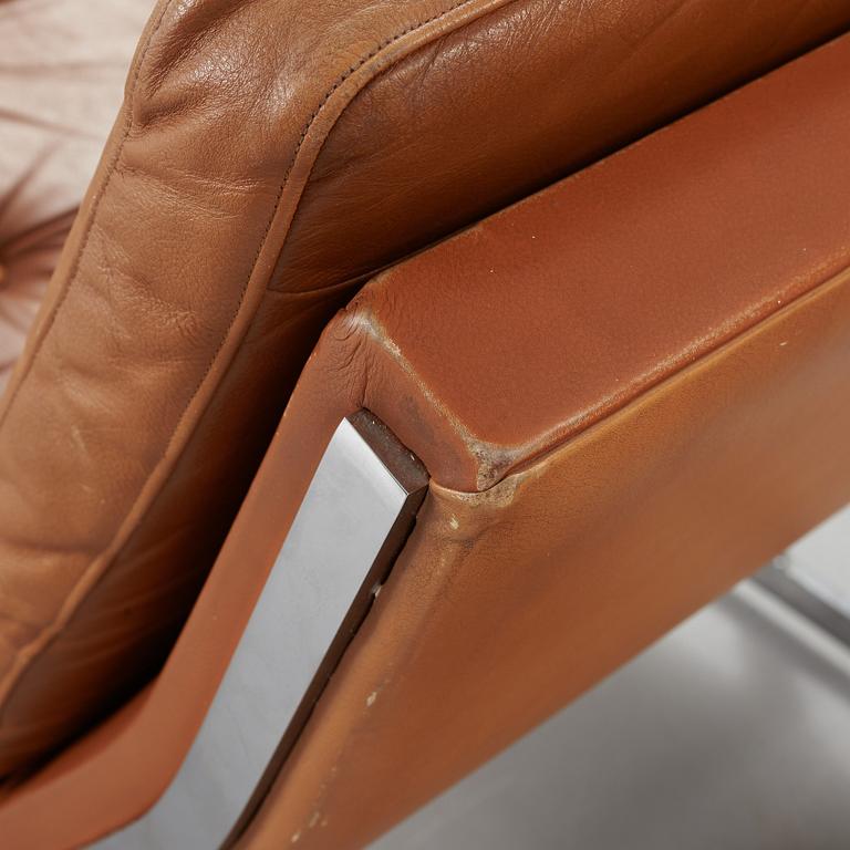 A pair of Poul Nørreklit chromed steel and brown leather easy chairs, Selectform, Denmark 1960's.