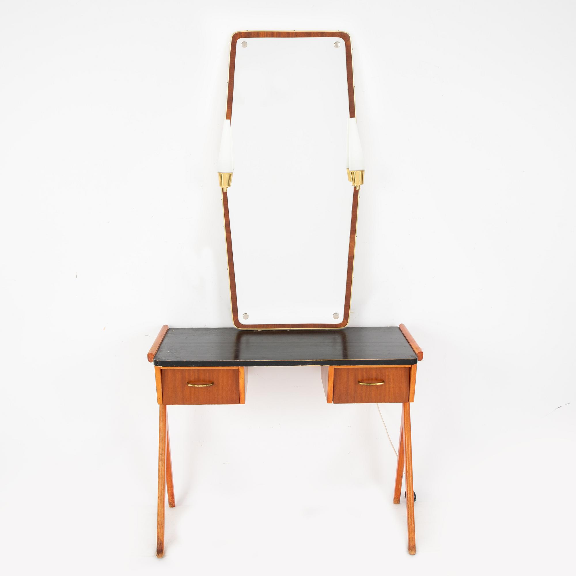 A 1950's dressing table with mirror.