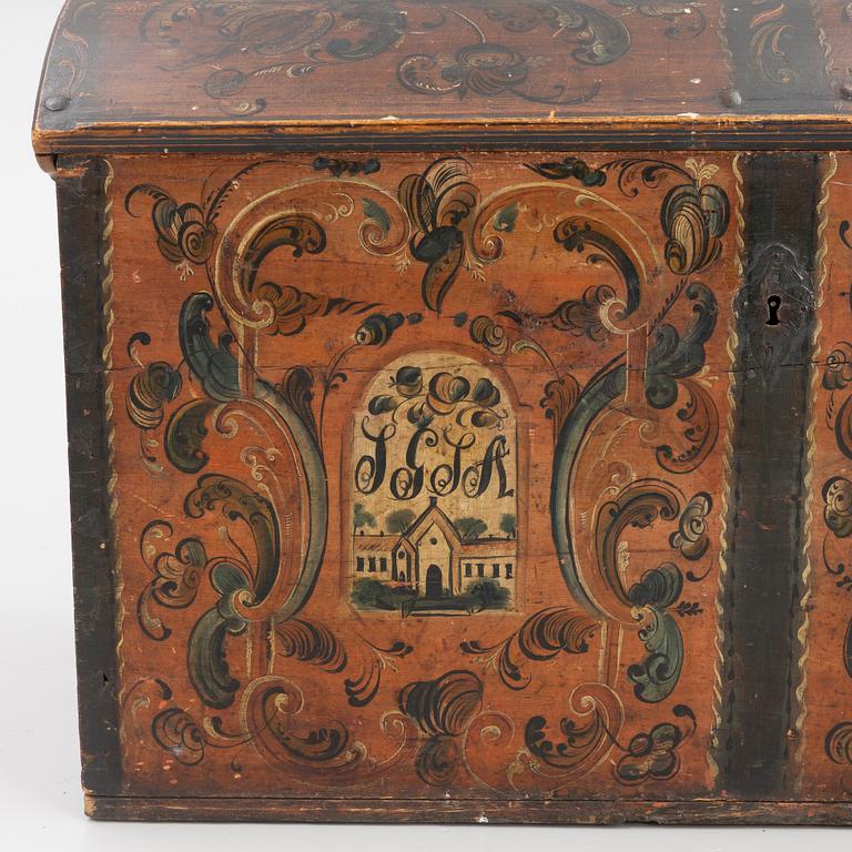 A wooden Dalecarlian chest, Sweden, dated 1820.