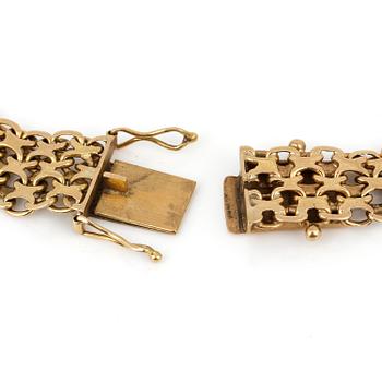 ARMLÄNK, 18K guld, Stockholm, 1956. Total vikt ca 16,69 g.