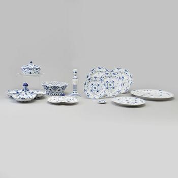 A 63 pcs porcelain service, 'Musselmalet', Helblond, Royal Copenhagen, Denmark, second half of the 20th century.