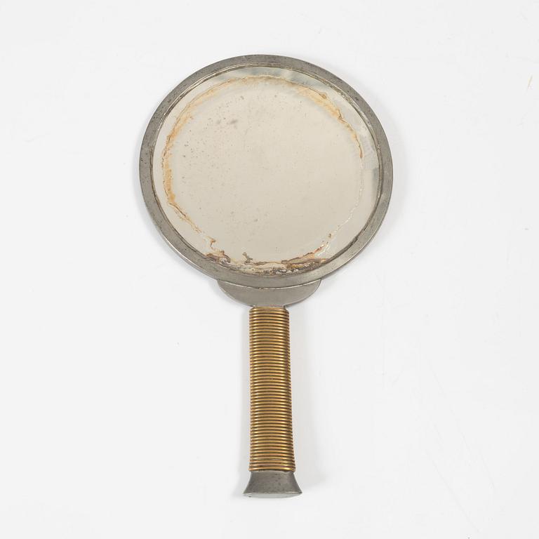 Estrid Ericson & Björn Trägårdh, a pewter and brass hand mirror model A 1444, Svenskt Tenn, Sweden 1930s-40s.