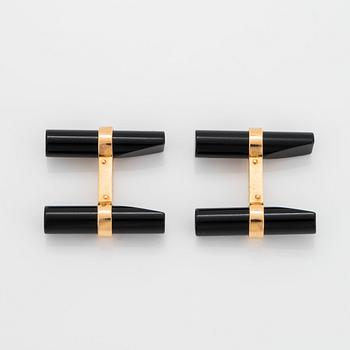 Cartier ett par manschettknappar 18K guld och onyx.