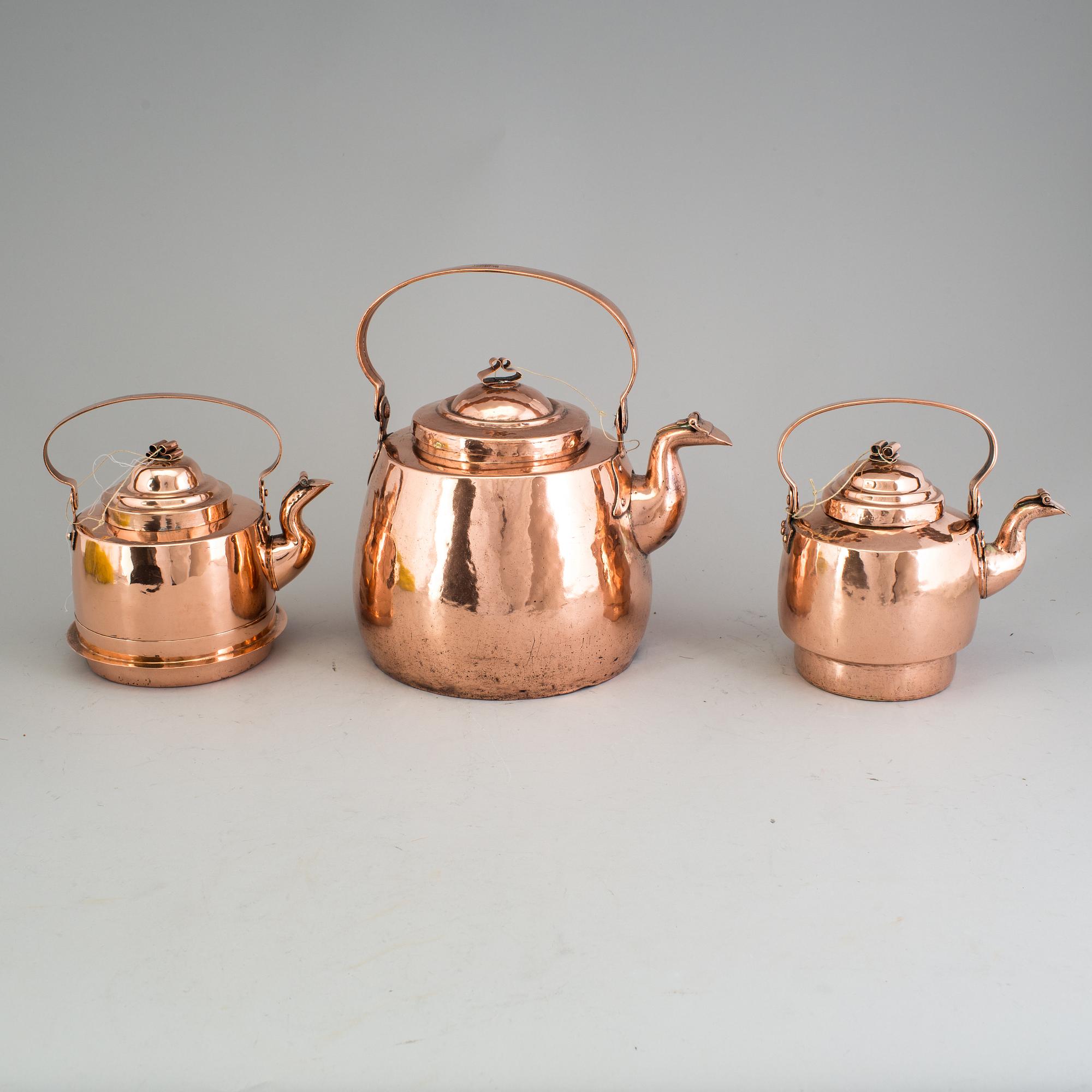 A set of three Pitchers of copper, 19th century, Sweden and Finland.