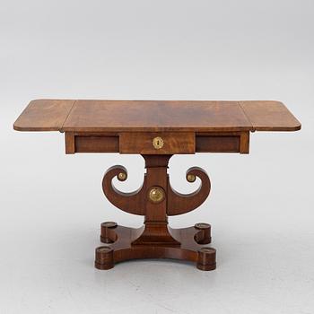 An Empire table, first half of the 19th century.