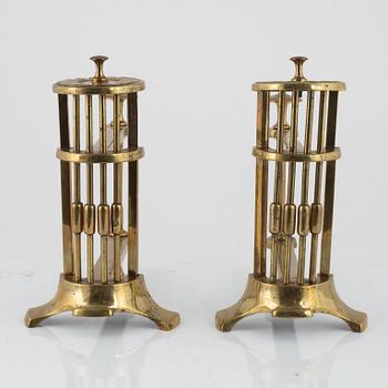 A pair of brass andirons, possibly England, around 1900.