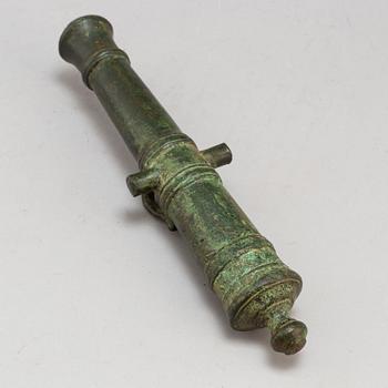 A small bronze cannon probably 19th Century.