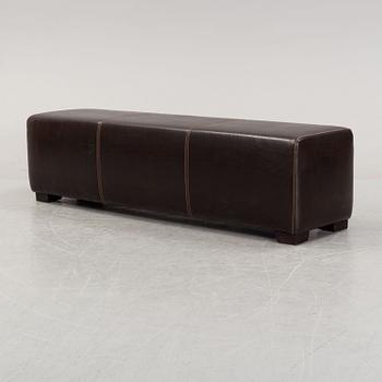 A leather-upholstered bench from Industria Divani e Poltrone, Italy.