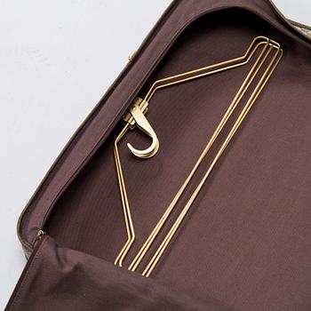 Gucci, a 'Savoy' garment bag.