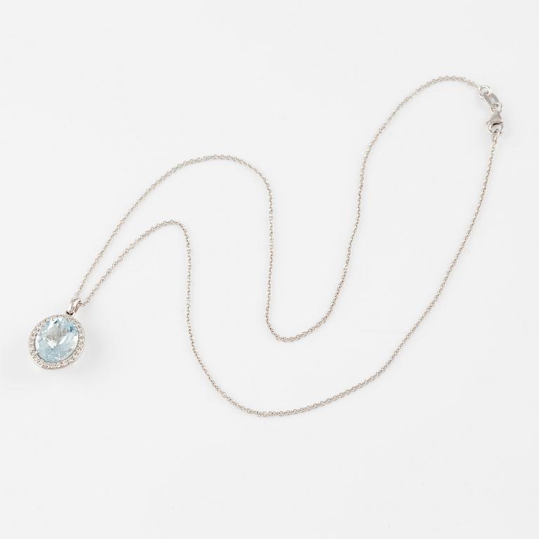 Pendant with chain in 18K gold and a faceted aquamarine and round brilliant-cut diamonds.