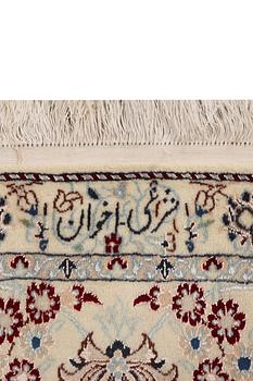 A Nain carpet, part silk, 6 laa, c. 295 x 205 cm.