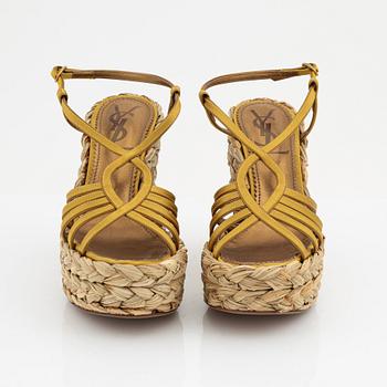 Yves Saint Laurent, a pair of wedge sandals, size 36.