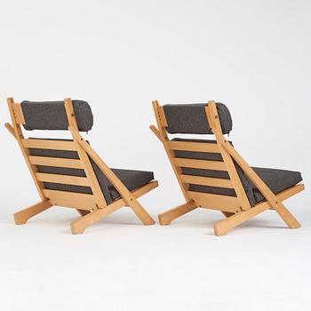 Hans J. Wegner, Hans J Wegner, a pair of "CH-03" easy chairs for Carl Hansen & Søn, Denmark, 1960-70's.