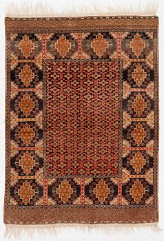An oriental rug, c. 175 x 125 cm.