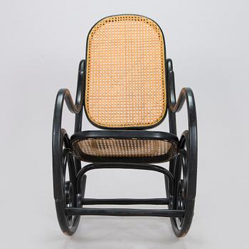 A mid-20th century Thonet style rocking chair.