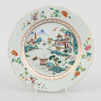 A group of three Chinese famille rose porcelain plates, Qing dynasty, Qianlong (1736-95).
