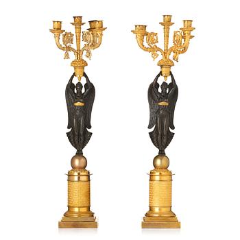 134. A pair of French Empire five-light candelabra, attributed to Francois Rabiat (bronze maker in Paris 1756-1815).
