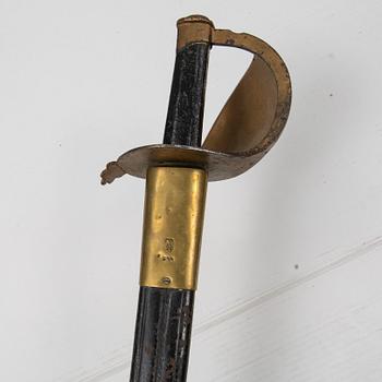 A Imperial German Navy cutlass with scabbard.