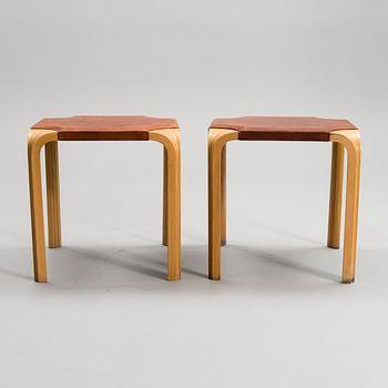 ALVAR AALTO, A PAIR OF X-LEG STOOLS. Model X601. Designed in 1954.