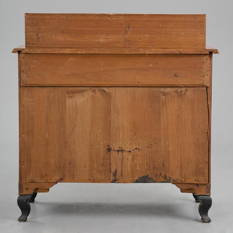 A Swedish late-Baroque burr-alder commode, first part 18th century.
