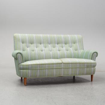 A second half of the 20th Century sofa by Carl Malmsten.