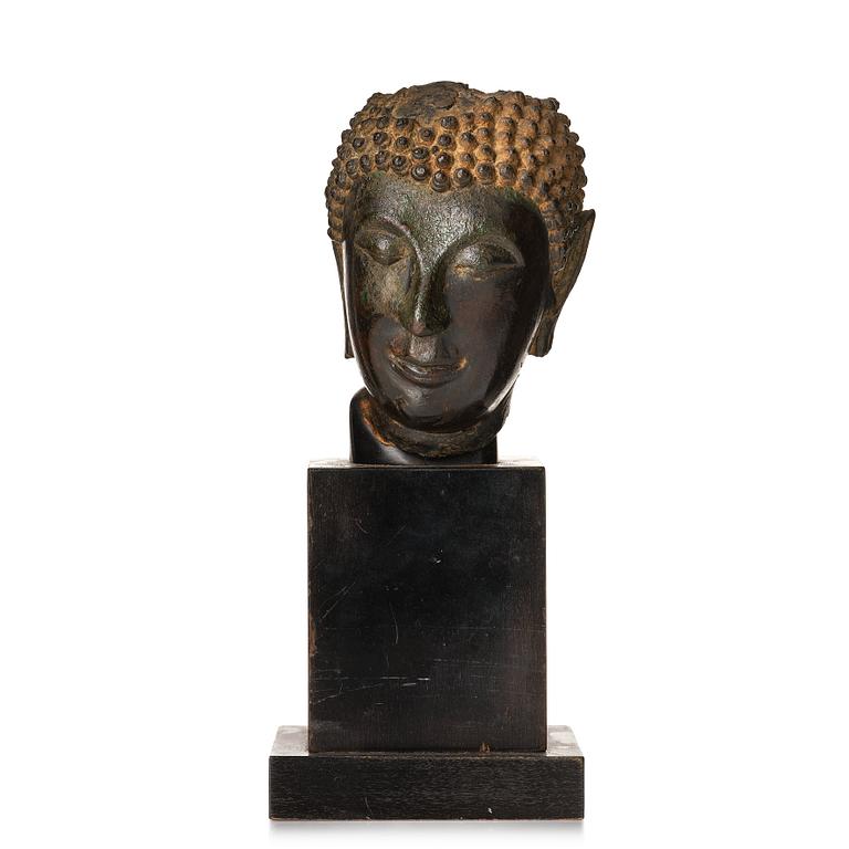 A bronze buddha head, Siam, Sawankhalok, 10th/11th Century.