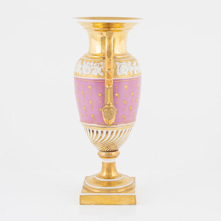 A gilt Empire porcelain vase, 19th Century.